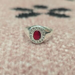 Radiant Silver Ring with Red Gemstone